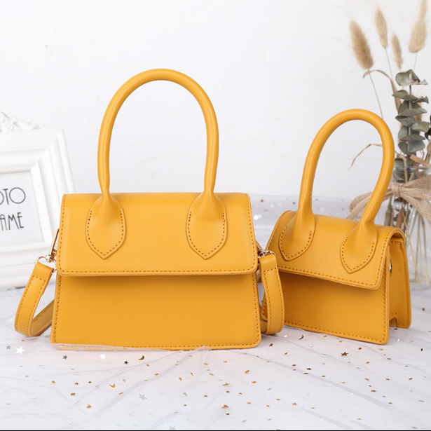 Small bag female 2021 new fashion slung simple scrub small concave shape yellow bag mini bag handbag