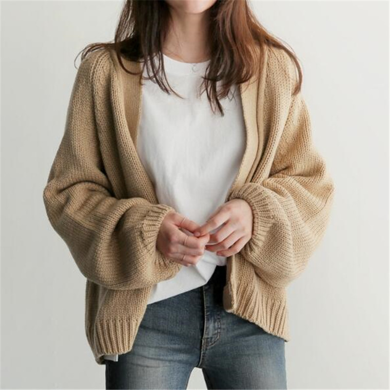 A short, long sleeve cardigan is versatile