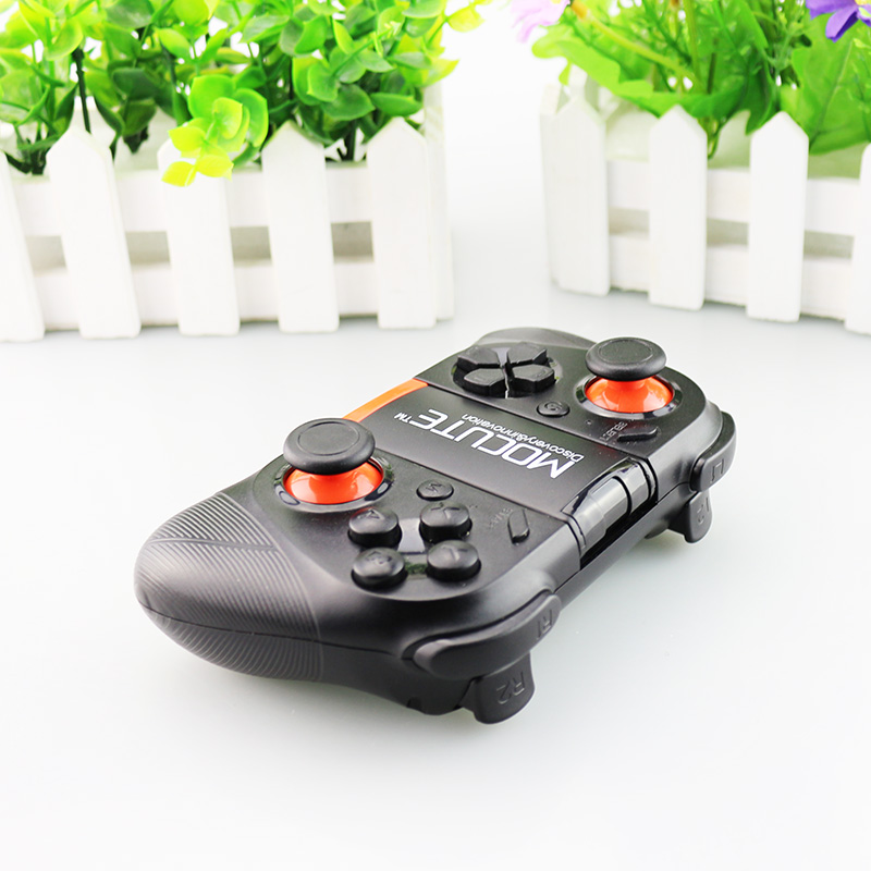 Compatible with Apple, MOCUTE magic card 050 Android IOS wireless Bluetooth VR remote control CF hand Swim handle escape from prison